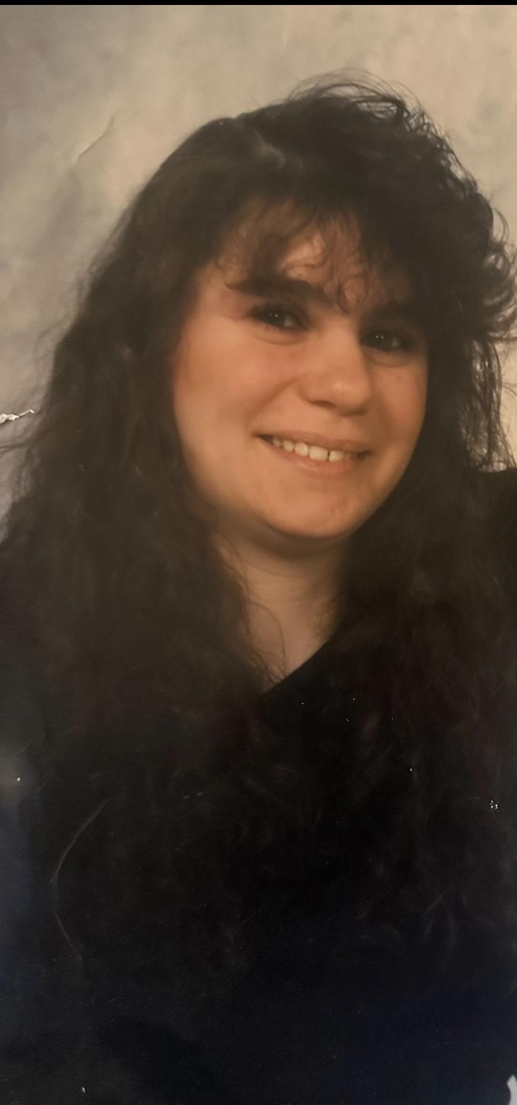 Andrea M. (Roumeliotis) Holmes, 55