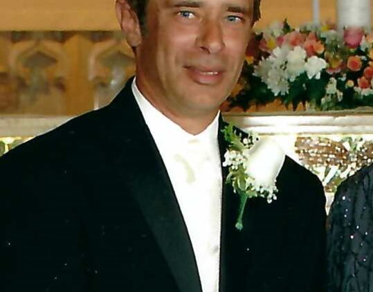 David N. Adams, 62