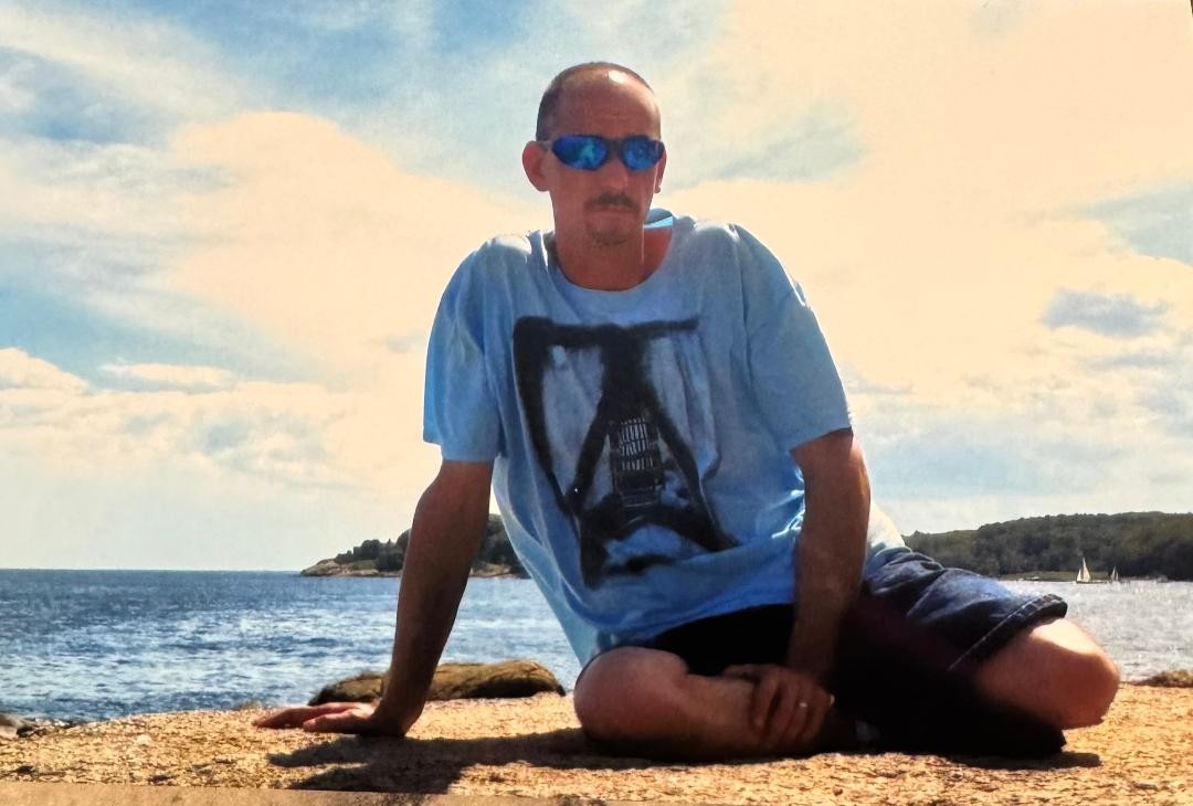 Michael E. Adams, 55